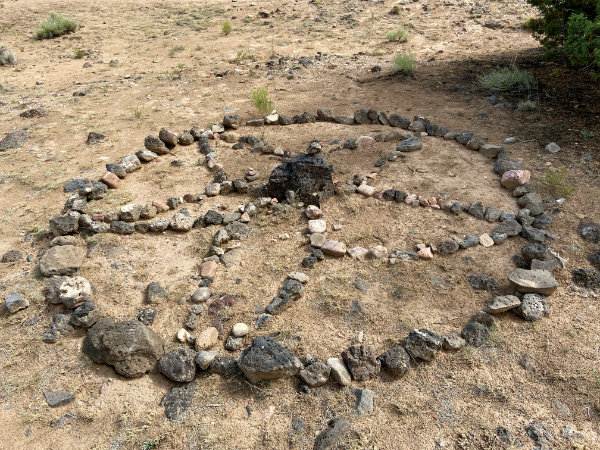 A “decorative” cairn made of stones lifted from their context at an archaeological site. Photograph courtesy Jessica