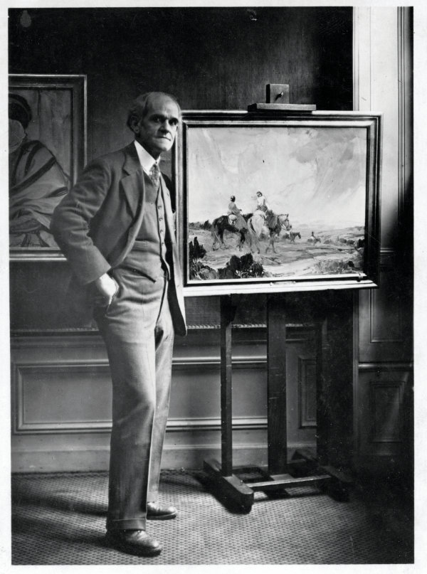 Gerald Cassidy with his painting, Navajo Romance, which was purchased by the French government for the Luxembourg Galleries in Paris, n.d. Courtesy the Hewett Collection, the Palace of the Governors Photo Archives (NMHM/ DCA), neg. no. 007121.