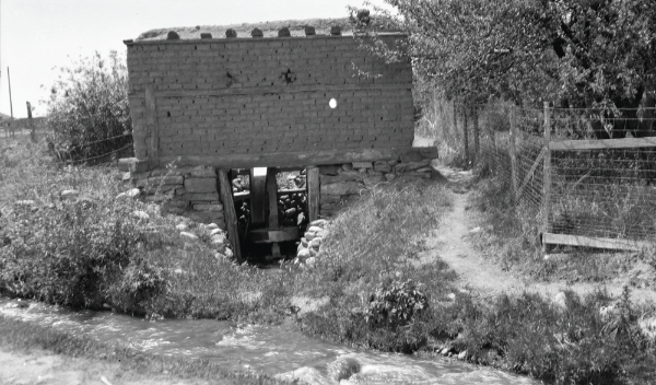 William H. Roberts, Old mill on Acequia Madre above Manhattan Street, Santa Fe, New Mexico, ca. 1920-1930. Courtesy of the Palace of the Governors Photo Archives (NMHM/DCA), 149931.