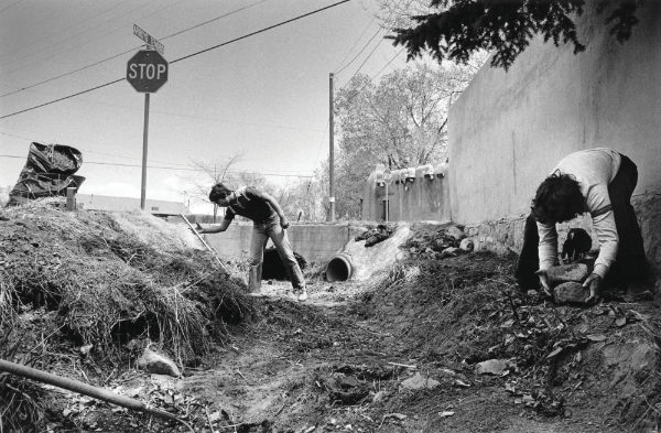 Volunteers helping with annual cleaning of Acequia Madre irrigation ditch dating to 1706, Santa Fe, New Mexico, 1984. Courtesy of the Palace of the Governors Photo Archives (NMHM/DCA), HP.2014.14.71.
