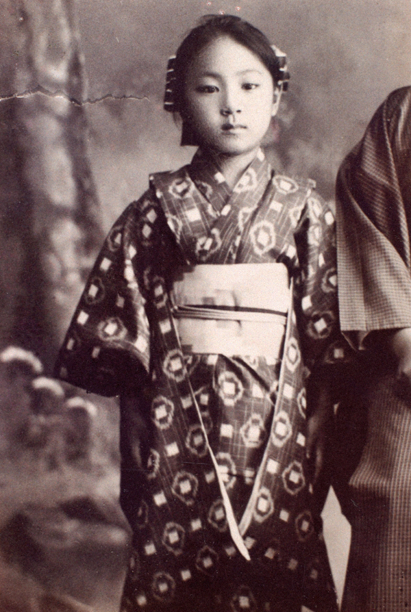 vintage photo of a japanese girl in kimono