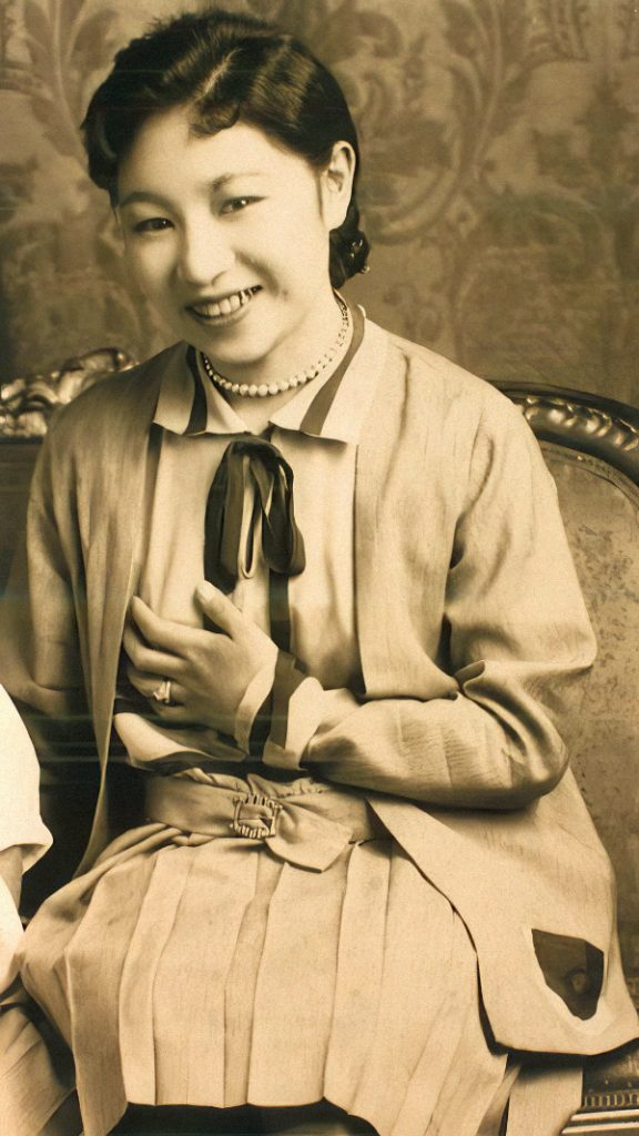 Vintage sepia photo of a japanese woman well dressed and smiling