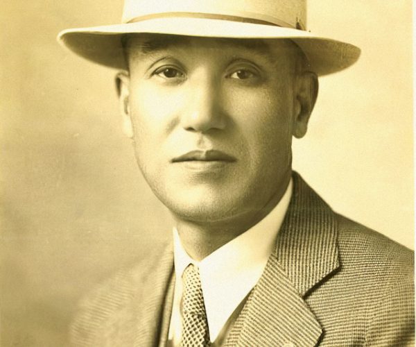 sepia toned vintage portrait of a japanese man