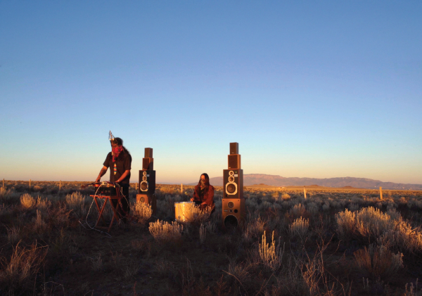 artists performing in desert wilderness