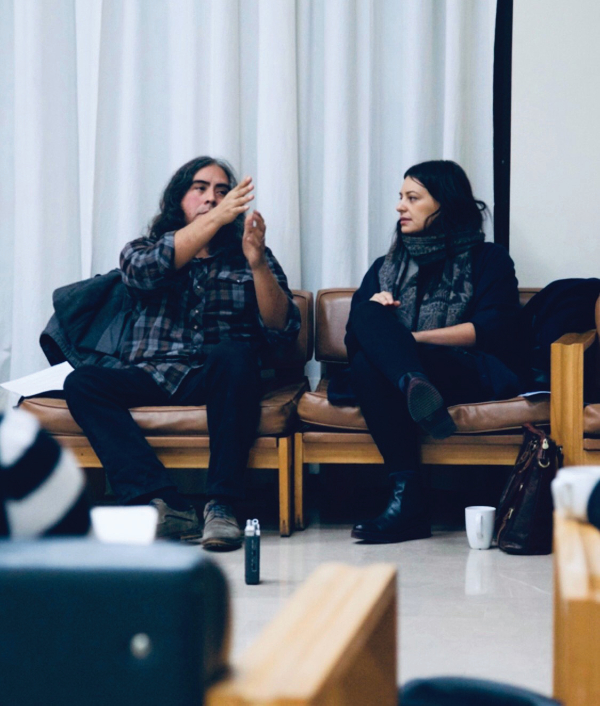 color photograph of the artists in conversation