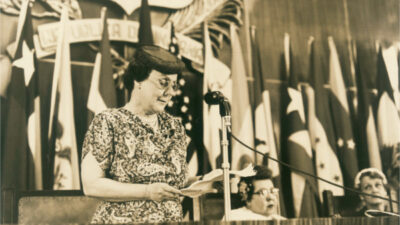 Bertha Lutz speaks at the end of the assembly of the Inter-American Commission of Women, Trujillo, Dominican Republic, 1956. Courtesy Brazilian Federation for Women’s Progress and public domain.