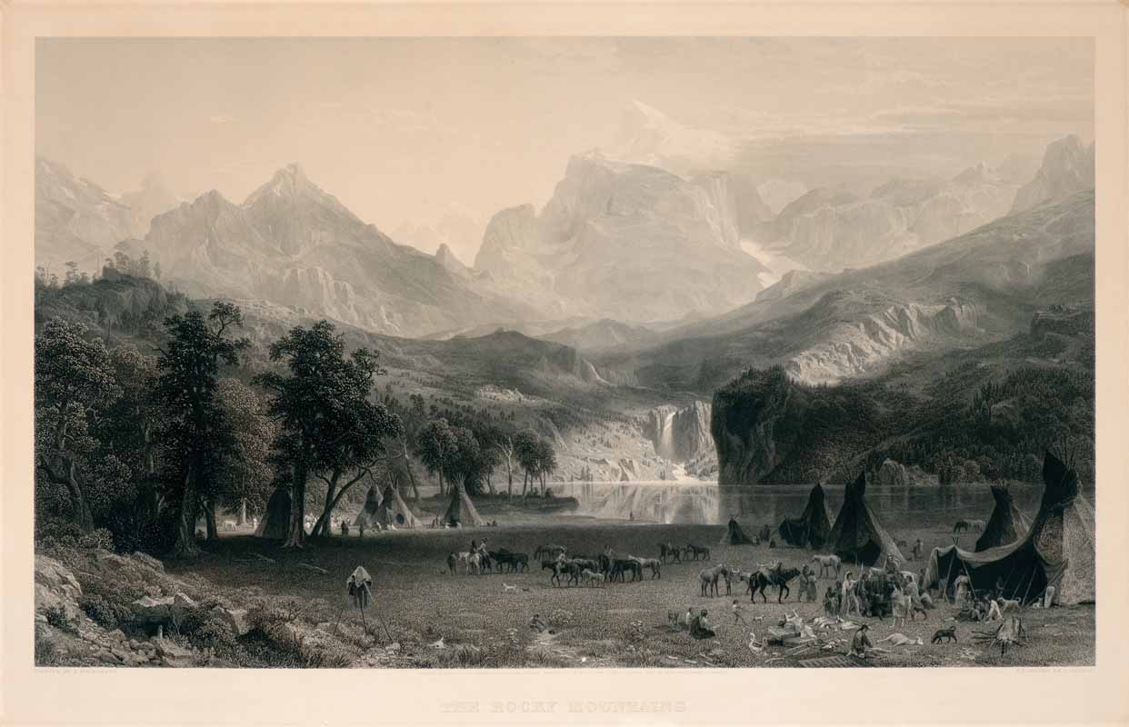 A group of tipis and people with horses in a grassy valley, bordered by trees, with tall mountains and a lake in the background. [gen-ai]