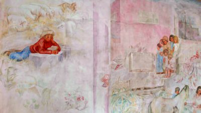 A mural depicts a person lying on the ground in a rural landscape on the left and a group of people with animals in front of pastel buildings on the right. [gen-ai]