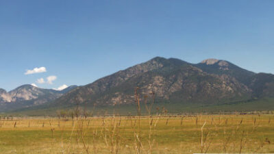 Southern Rocky Mountains: Taos Range of the Sangre de Cristo Mountains viewed just outside Taos, New Mexico. Old rocks were folded into mountains at the end of the age of dinosaurs and then shaped by glaciers. Photograph by Larry Crumpler, New Mexico Museum of Natural History and Science.