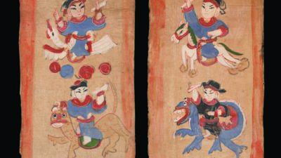 Two painted cloth panels depict figures in colorful attire, some riding animals, set against a plain background with red borders. [gen-ai]