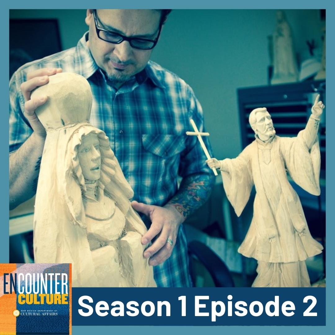 A man in glasses and a plaid shirt inspects two wooden religious sculptures, one of Mary and another of Jesus holding a cross. Text reads Encounter Culture Season 1 Episode 2. [gen-ai]