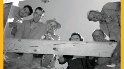 Five people look down into a wooden structure from above, with a clear sky in the background. Text reads: Encounter Culture Season 1 Episode 5. [gen-ai]