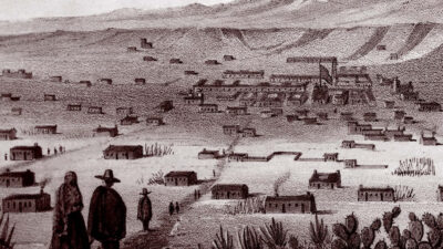 Sepia-toned historical illustration of a small rural settlement with scattered buildings, mountains in the background, and a few figures in the foreground. [gen-ai]