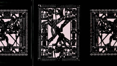 Three rectangular panels feature intricate, symmetrical black cutout designs with abstract and possibly mythological figures against a light background. [gen-ai]