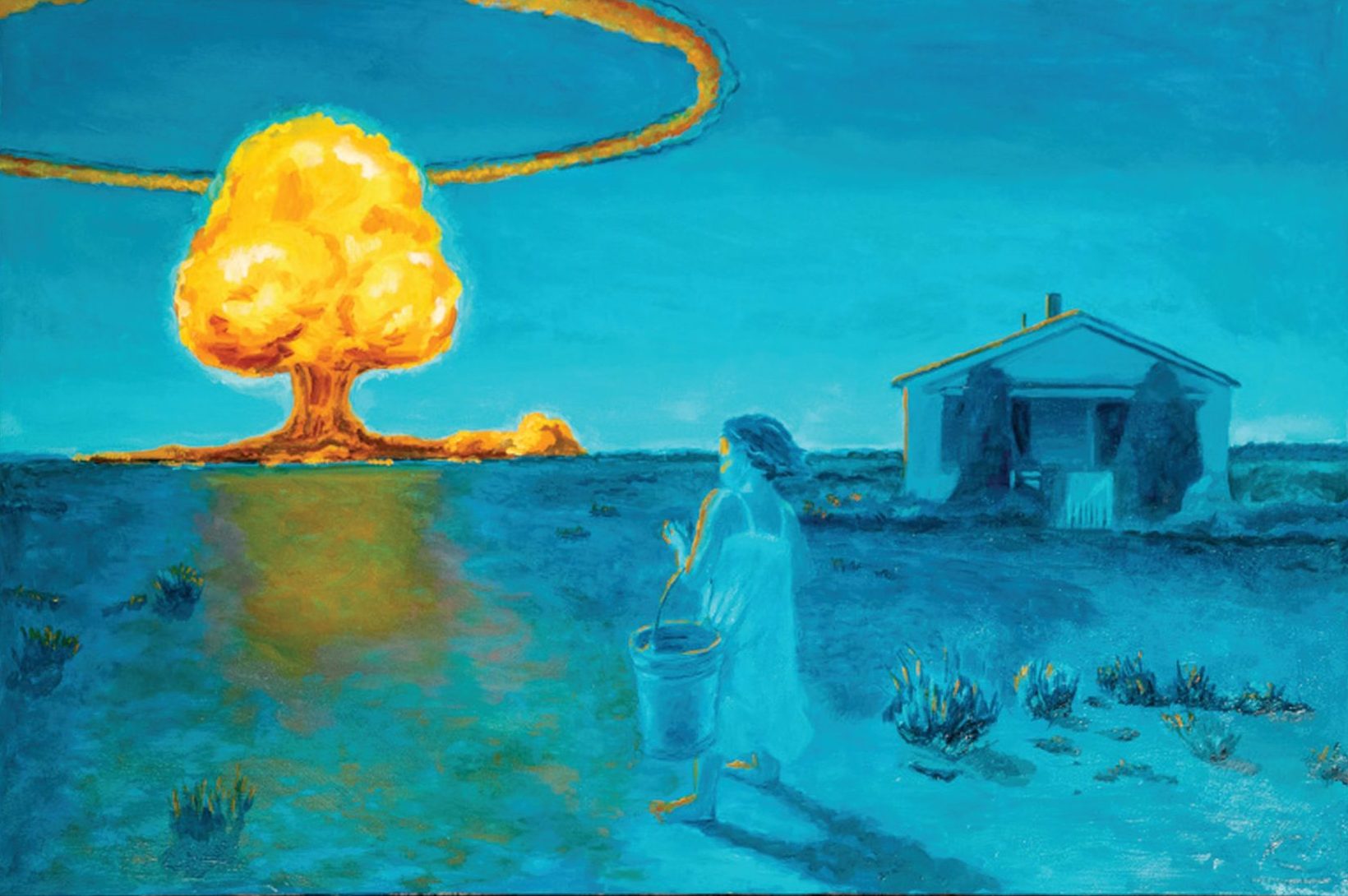 A woman carrying a bucket stands outside a house, watching a large nuclear explosion with a mushroom cloud in the distance under a blue sky.